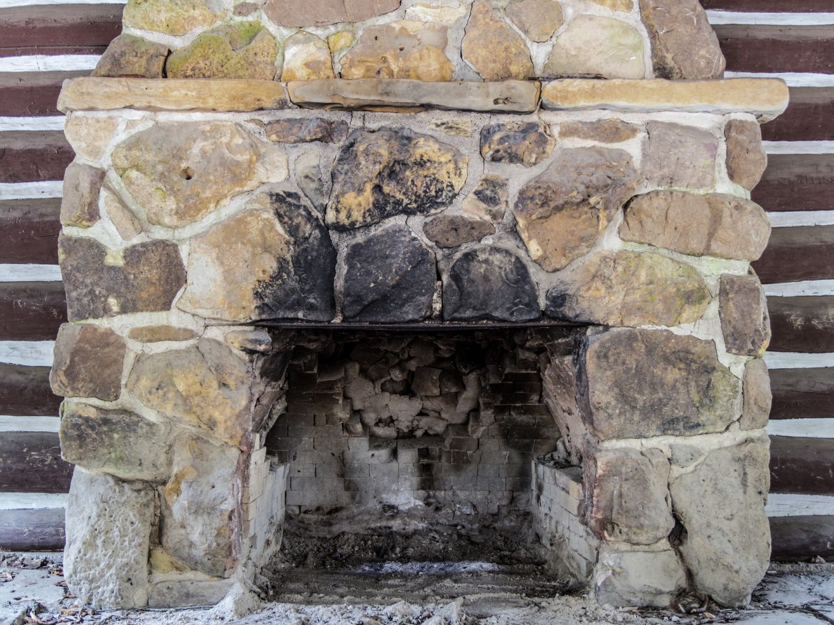 Stained natural stone fireplace